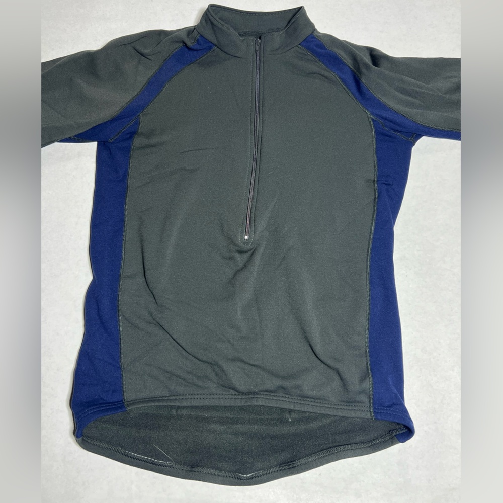 Performance Brand Cycling 1/2 zip light jacket.